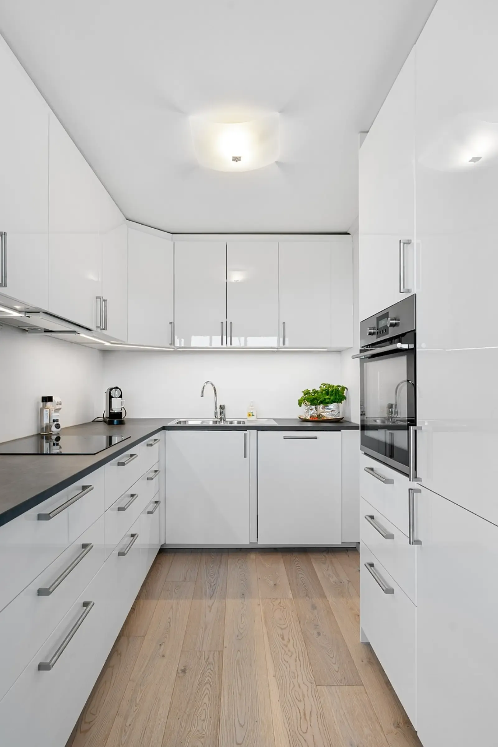 View of a kitchen in a modern home.